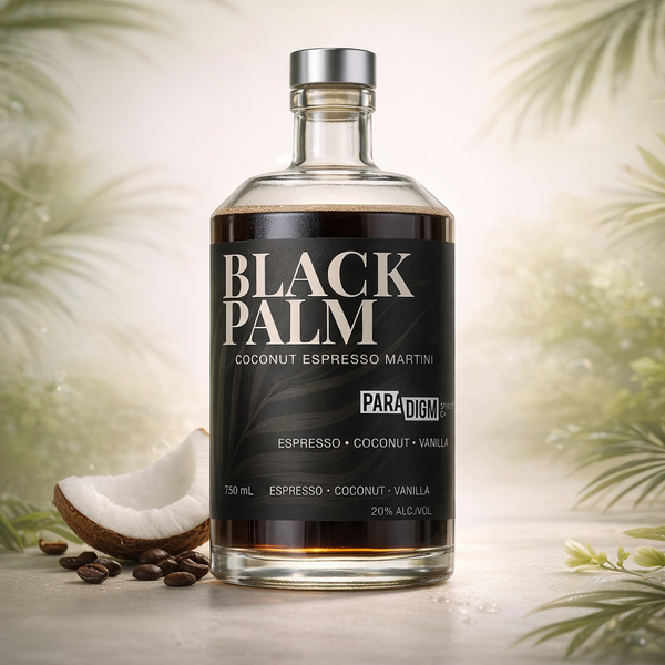 A bottle of Black Palm coconut espresso martini with coffee beans and coconut